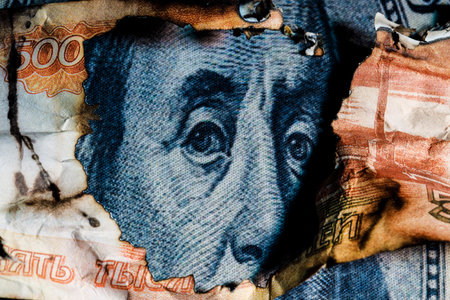 Benjamin Franklins face peeking out of a hole in a 5000 ruble banknote. High quality photo