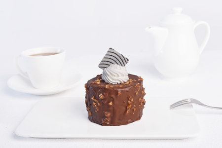 Tasty big piece of cake on a plate on a white background