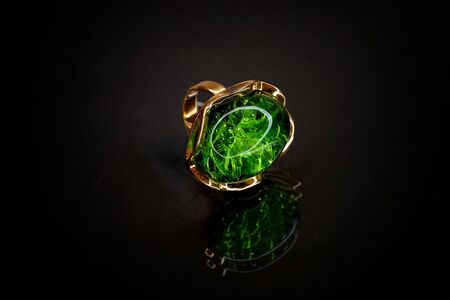 Unique pieces of transparent yellow amber on a white background. Macro photography of vintage pieces of amberの写真素材