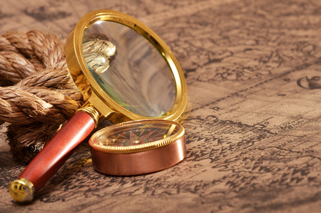 map and magnifying glassの写真素材