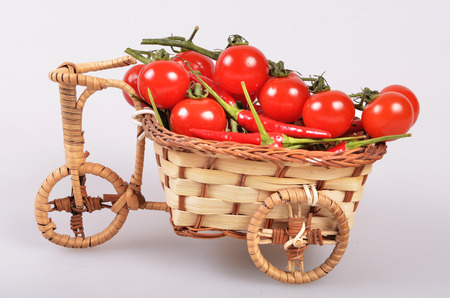 cherry tomatoes and peppersの写真素材