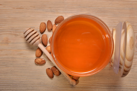 jar with honey and stick for honeyの写真素材