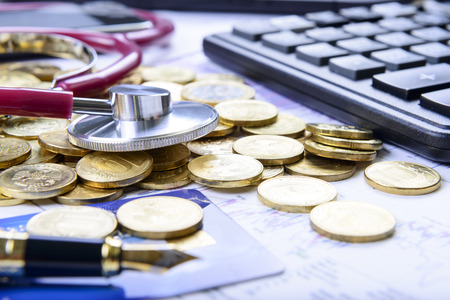 Business composition of stethoscope on the moneyの写真素材