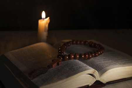 religious theme holy book with a crossの写真素材