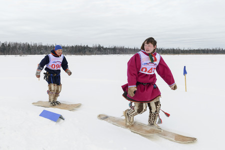 Competitions in skiing among the Nenets reindeer herder Day, the Yamal Peninsulaのeditorial素材