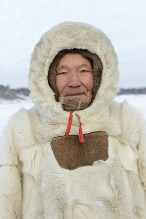 portrait of elderly Nenets in national clothes, malitsa. The Yamal Peninsulaのeditorial素材