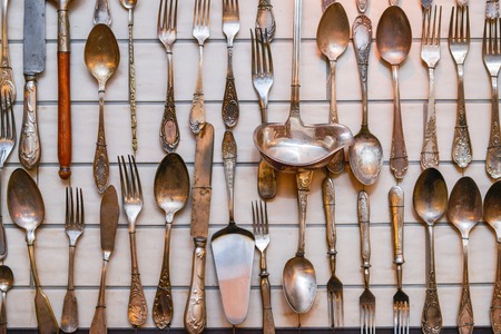 Steel kitchen knife and table cutlery steel metal set on backgroundの写真素材