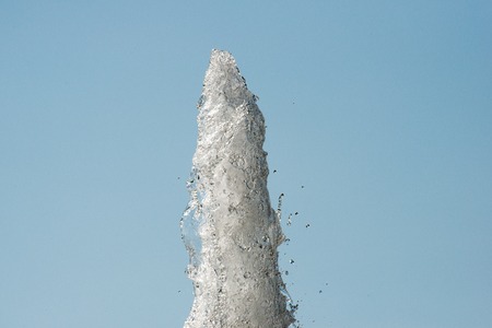 Foam Jet fountain on the sky backgroundの写真素材