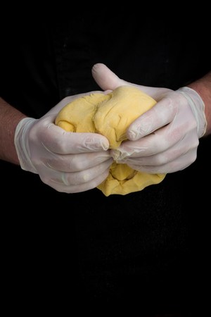 Closeup of process of making cooking homemade pasta. Chef make fresh italian traditional pastaの写真素材