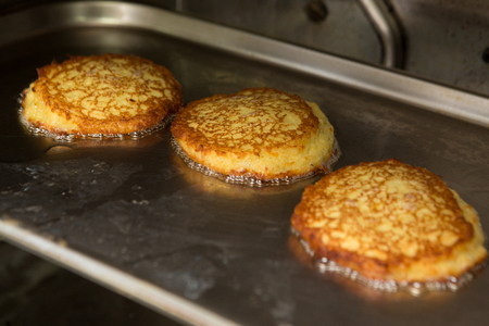 Potato Pancakes. Vegetable fritters. Latkes in frying panの写真素材