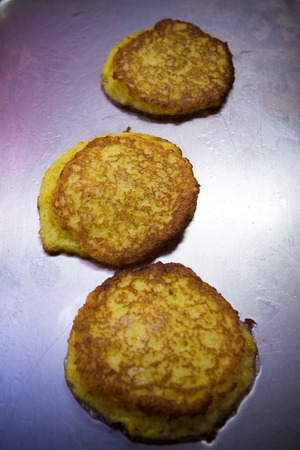 Potato Pancakes. Vegetable fritters. Latkes in frying panの写真素材