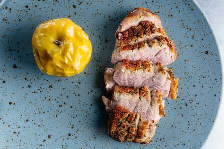 Roast duck with caramelized applesの写真素材