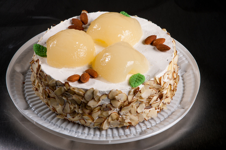cream fruit cakes with fruits and berriesの写真素材