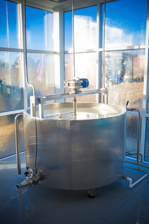 Cheese maker -Traditional cheese making at a creamery,の写真素材