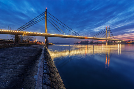 Bridge across river at night with artificial lightning, Belgrade Serbiaの写真素材