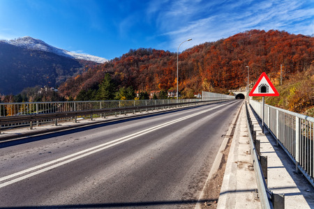 Mountain bridge in winter with snow and blue sky, Zlatibor mountain, Serbiaの写真素材
