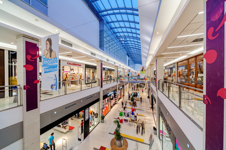 Interior of shopping mall with people walkingのeditorial素材