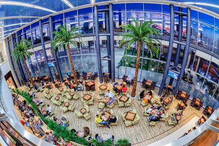Interior of shopping mall with people walkingのeditorial素材