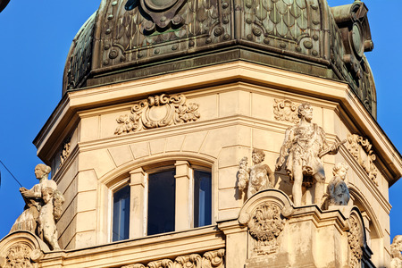 stone facade on classical building with ornaments and sculpturesの写真素材