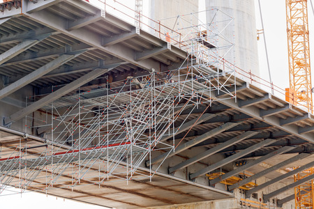 steel bridge construction with scaffoldingの写真素材