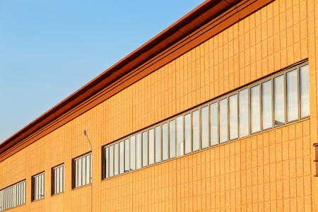 Exterior of industrial building on a sunny dayの写真素材