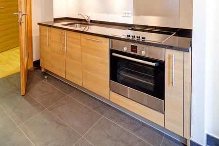 modern kitchen interior with sink and appliancesの写真素材