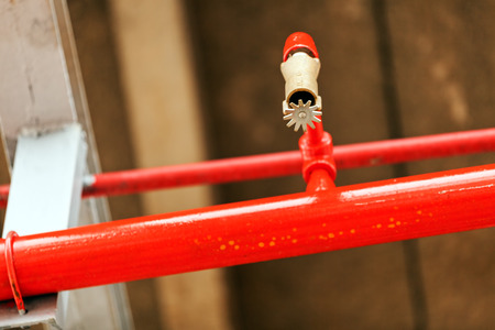 detail of oil pipeline with valves in large oil refineryの写真素材