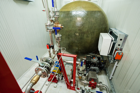 detail of oil pipeline with valves in large oil refineryの写真素材