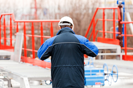 detail of oil pipeline with valves in large oil refineryの写真素材