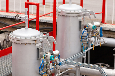detail of oil pipeline with valves in large oil refineryの写真素材