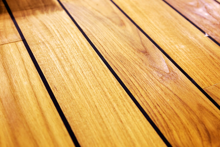 texture of wooden worm colored parquet floorの写真素材