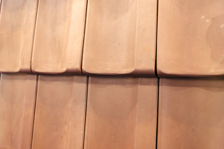 pattern detail of orange ceramic roof tilesの写真素材