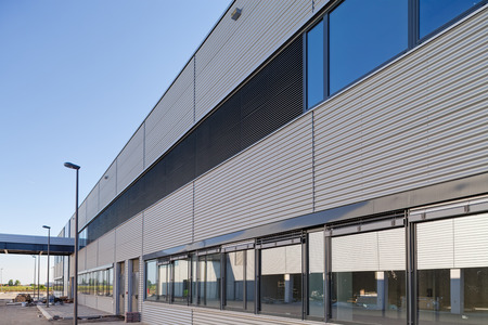 details of aluminum facade and aluminum panels on industrial buildingの写真素材