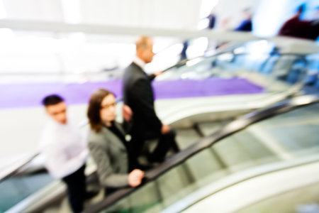 Blur of people on electric stairs in the mall; blurred 100%の写真素材
