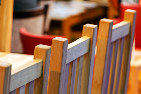 Wooden chair detail in small living roomの写真素材