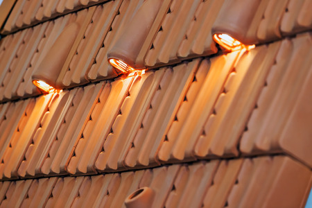 Detail of roof tiles on exhibition stand at construction fairの写真素材