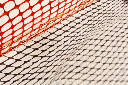 plastic safety net for construction site, note shallow dept of field