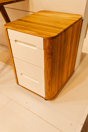 wooden commode with drawers for the house, note shallow depth of field