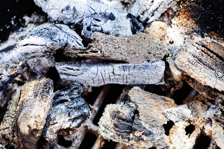 Ash from wood fire in a barbecueの写真素材