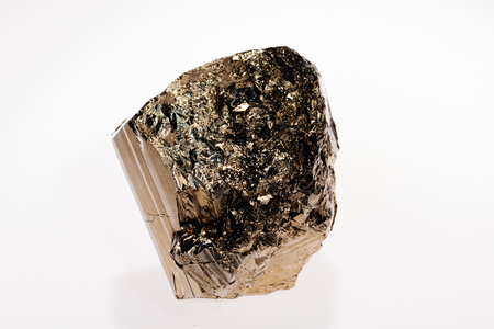 pyrites, mineral from the group of sulfides on the white backgroundの写真素材