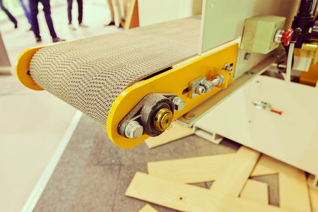 part of the machine for making furniture, note shallow depth of field
