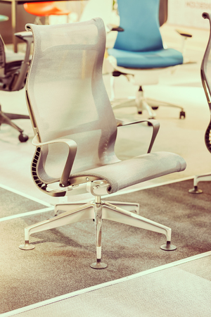 type of work chairs in the exhibition hall, note shallow depth of fieldの写真素材