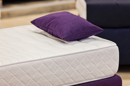 exhibit the pattern of the mattress to the bed, note shallow depth of fieldの写真素材