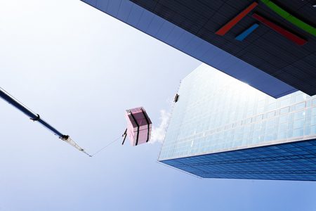 transfer cargo crane on a buildingの写真素材