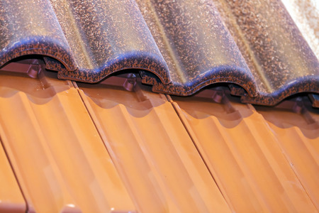 Detail of roof tiles on exhibition stand at construction fairの写真素材