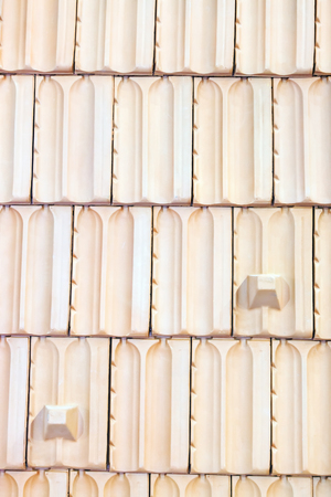 Detail of roof tiles on exhibition stand at construction fairの写真素材