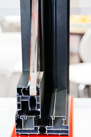 Window profile cut of with metal, glass and insulationの写真素材