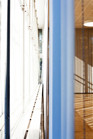 striped white curtains at the window in profile, note shallow depth of fieldの写真素材