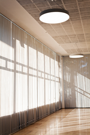 white striped curtains in the interior, note shallow depth of fieldの写真素材