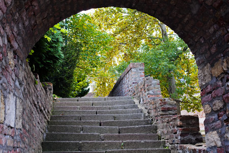 Old amazing stone stairs with a gate at a top